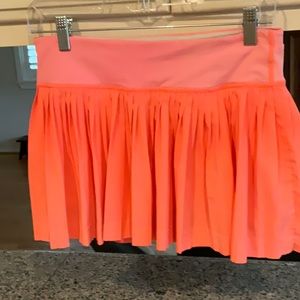 Orange tennis skirt
